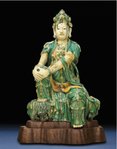 A Rare Ming Sancai Glazed Stoneware Figure of Guanyin